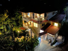 OASIS VILLA Suites & Rooms